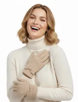 Guantes de tejido soft color beige, con un pequeño lazo decorativo en la muñeca.