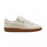 Championes Puma Palermo Premium color crema con detalles en rosa y suela de goma marrón.