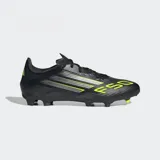 Championes de fútbol Adidas F50 League FG/MG, color negro con detalles en amarillo neón y plateado. Presentan exterior Fiberskin con estampado Sprintgrid y suela Sprintplate para múltiples superficies.