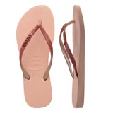 Sandalias Havaianas Slim Glitter II color beige arena, con tiras finas con glitter.