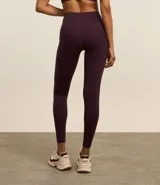 Calza legging deportiva color verde agua, de microfibra, con cintura ancha y bolsillos laterales.