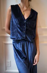 Pantalón palazzo verde musgo de terciopelo con cintura elastizada.