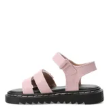 Sandalias blancas con plataforma negra y tiras con apliques de flores.