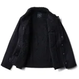 Campera de paño azul oscuro con cuello de corderito, cierre con botones a presión y múltiples bolsillos.
