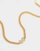 Collar dorado de cadena gruesa con dije de mariposa con strass.