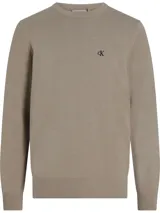 Sweater de punto color beige con cuello redondo y logo 'ck' bordado en el pecho.