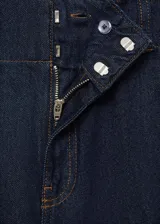 Pantalón de jean azul oscuro de corte wide leg, tiro alto y doble trabilla.