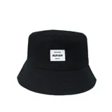 Gorro tipo bucket negro de algodón con etiqueta blanca con el logo de la marca Rufián.