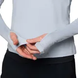 Remera deportiva Columbia Weekend Ascent Half Zip para mujer, color gris claro, de manga larga con orificios para los pulgares y cierre de media cremallera. Confeccionada con tejido transpirable Omni-Wick™ que absorbe la humedad y neutraliza los olores.