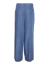 Pantalón largo de calce suelto y tiro medio. Diseño tipo denim con terminaciones clásicas y confección en tejido plano de lyocell con ligamento, que aporta caída y suavidad.