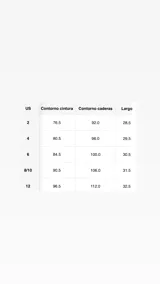 Minifalda con estampado de piel de jaguar, de tiro bajo, con volados superpuestos y ajuste lateral con lazos.