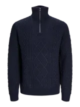 Sweater de punto trenzado azul marino con cuello alto y cierre de cremallera metálica.