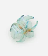 Pinza para el pelo con forma de flor color turquesa iridiscente. Incluye caja de regalo.