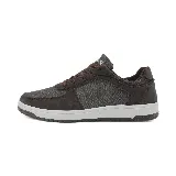 Championes urbanos grises de tela y cuero sintético, con cordones y suela blanca.