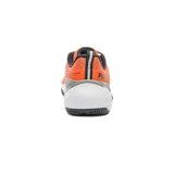 Championes Fila Champion Tenis Winner, color naranja con detalles en negro y suela blanca.