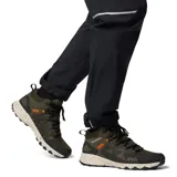 Botas de senderismo Columbia Peakfreak II Mid, color verde oliva con detalles en negro y naranja. Fabricadas con tecnología OutDry™ impermeable y transpirable, entresuela TechLite+™ para amortiguación y suela Adapt Trax™ para tracción.