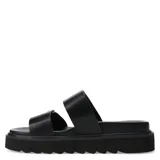 Sandalias plateadas con plataforma y doble tira con hebillas.