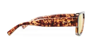 Lentes de sol estilo aviador con montura carey y lentes amarillas.