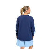 Buzo azul marino de corte holgado con mangas ranglan celestes y escudo del Club Nacional de Football bordado en el pecho.