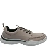 Zapatillas urbanas marca Hush Puppies modelo Alfie Lace, color azul marino con cordones celestes y suela blanca. Fabricadas con tela reciclada y tecnología Smart Foam Tech para mayor comodidad.