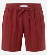 Bermuda de playa recta color mostaza, con textura de rayas y lazo en la cintura.