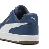 Championes Puma Caven 2.0 azules con detalles en blanco y suela marrón.