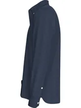 Camisa de manga larga Tommy Hilfiger de algodón Oxford color azul con cuello abotonado y logo bordado en el pecho.