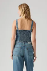 Bustier de jean con cierre frontal y breteles anchos.