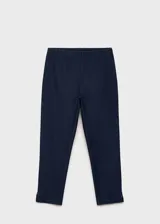 Calza capri azul marino de tejido elástico.