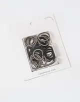 Set de 50 gomitas elásticas para el pelo en colores negro, gris y blanco.