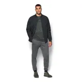 Pantalón de jogging Under Armour Sportstyle Tricot color azul petróleo, de corte ajustado, con cintura elástica ajustable con cordón y bolsillos laterales.