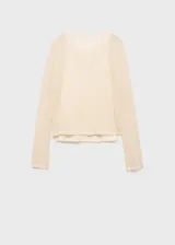Jersey de punto fino color crema, con cuello redondo, diseño recto y mangas largas. Incluye una musculosa al tono.