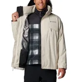 Campera Columbia 3 en 1 color azul marino, con capa exterior impermeable y transpirable, tecnología termorreflectante Omni-Heat™ y forro polar interior. Capucha desmontable y ajustable, puños y dobladillo ajustables, bolsillos con cremallera y protector de barbilla.