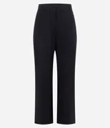 Pantalón femenino de punto roma color azul marino, de corte recto, con pliegues frontales y bolsillos laterales.