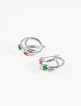 Aros de acero quirúrgico hipoalergénico con diseño triple y strass en colores variados.