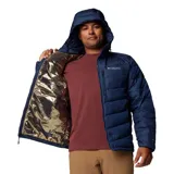 Campera inflada Columbia Labyrinth Loop II azul marino para hombre, con capucha ajustable con cordón, cierre frontal con cremallera, bolsillos laterales con cremallera, puños elásticos y dobladillo ajustable con cordón. Cuenta con forro con tecnología Omni-Heat Infinity, tecnología Omni-Shield y aislamiento Thermarator de poliéster reciclado al 100%.