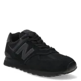 Championes urbanos New Balance modelo 574, color negro, confeccionados en gamuza y malla, con logo "N" característico en los laterales y entresuela ENCAP.