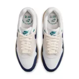 Championes Nike Air Max 1 de hombre, color blanco, azul y beige con detalles en verde.