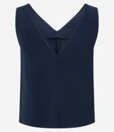Musculosa sin mangas confeccionada en viscosa sostenible, con escote en pico y corte vertical.