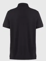 Chomba negra de piqué de algodón elástico, corte regular, cuello clásico y logo de Tommy Hilfiger bordado en el pecho.