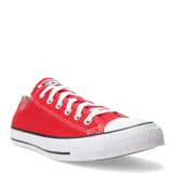 Championes Converse Chuck Taylor All Star de lona color rojo con suela de goma blanca.