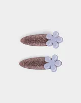 Set de dos hebillas para el pelo tipo piquito de pato, color marrón con glitter y aplique de flor lila.