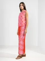 Musculosa de viscosa y poliamida con estampado de flores, con lazos en los costados.