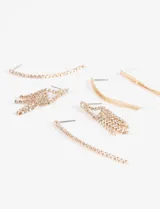 Set de caravanas plateadas con strass, con diferentes diseños colgantes.