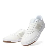 Championes urbanos New Balance color blanco con detalles en verde claro, capellada de cuero y suela de goma.