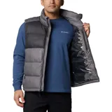 Chaleco acolchado Columbia Pike Lake II para hombre, con aislante térmico y forro termorreflectante Omni-Heat. Diseño en bloques de color negro en la parte superior y gris en la inferior, con cierre frontal y bolsillos laterales con cremallera. Logo de Columbia bordado en el pecho.