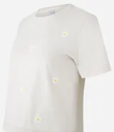 Blusa baby look color beige con bordado de margaritas.