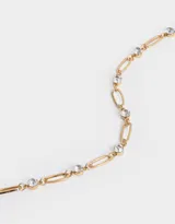 Collar corto bañado en oro con cadena de eslabones alargados y strass.