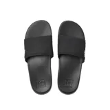 Ojotas Reef One Slide color negro, con plantilla de EVA moldeada por inyección y correa acolchada.