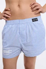 Short de pijama con estampado a cuadros blanco y negro, con cintura elástica.